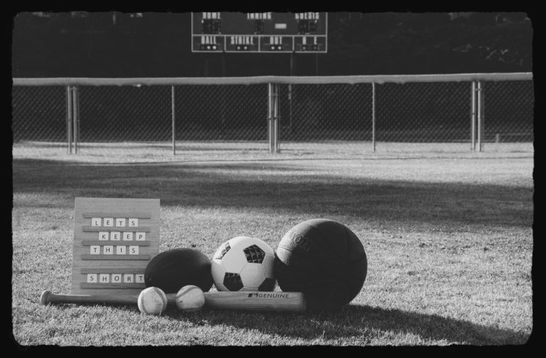 To emphasize great advice for young athletes, a sign says: "Let's keep this short" is shown on a baseball field.